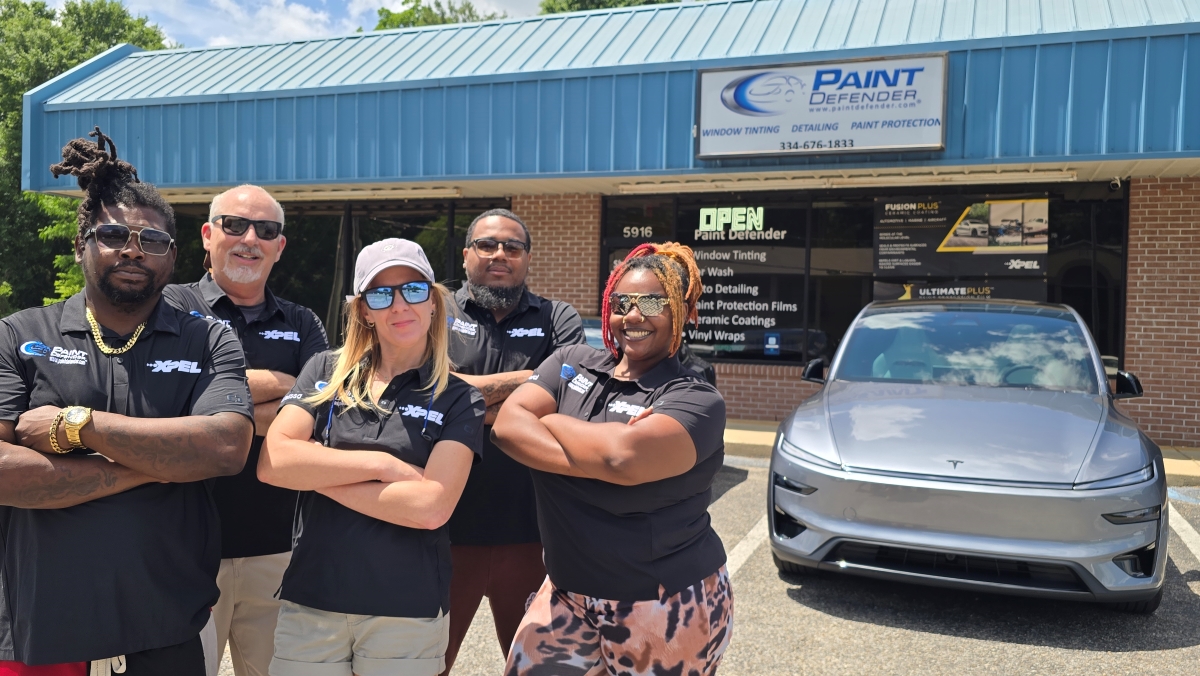 The Paint Defender team standing outside our shop. We are hiring for automotive installer jobs in Montgomery, AL.