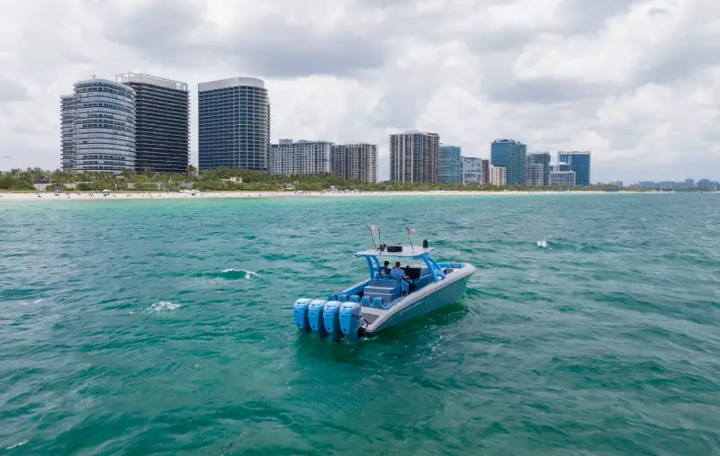 Center console boat receiving marine ceramic coating and XPEL protective film at Paint Defender in Montgomery, AL.